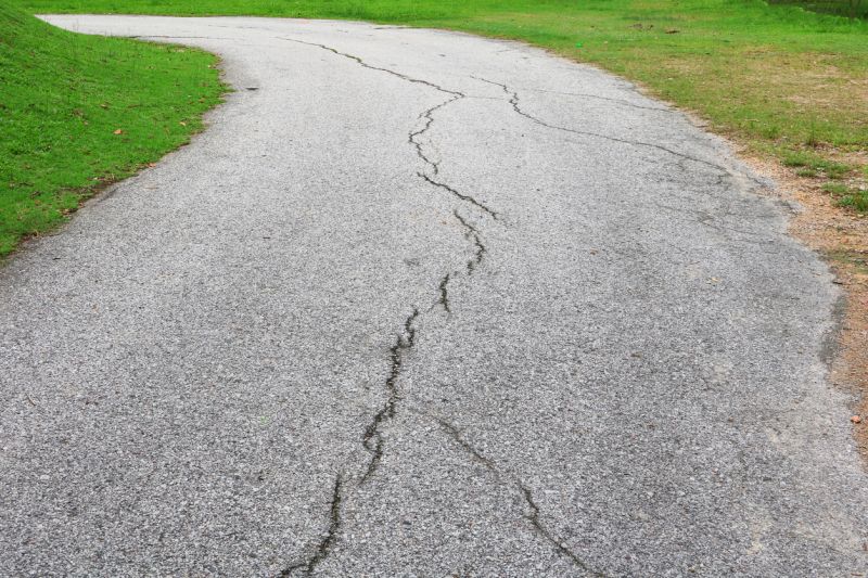 Cracked Driveway Before Repair